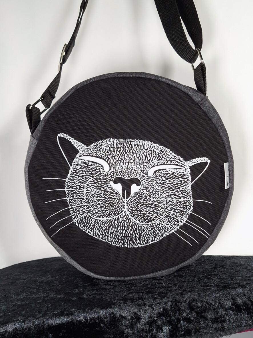 pyöreäolkalaukkuhappykittyfarkku