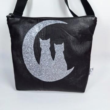 kuutamonahkalaukkumustaglitteri