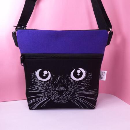 kasvot pimeässäviolettiolkalaukku